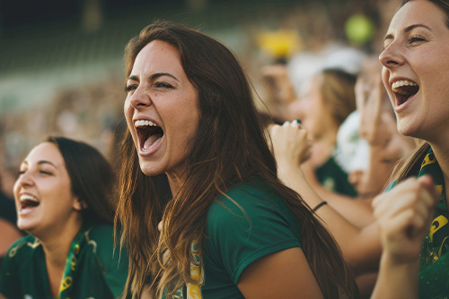 Two fans cheering at an NDSU football game