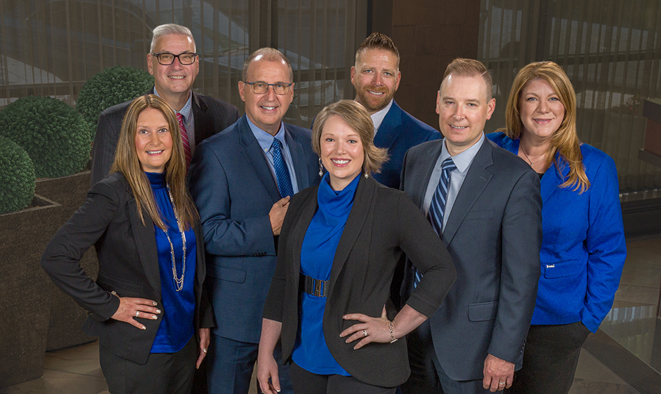 Gate City Bank’s executive leadership team gathers together for a group photo