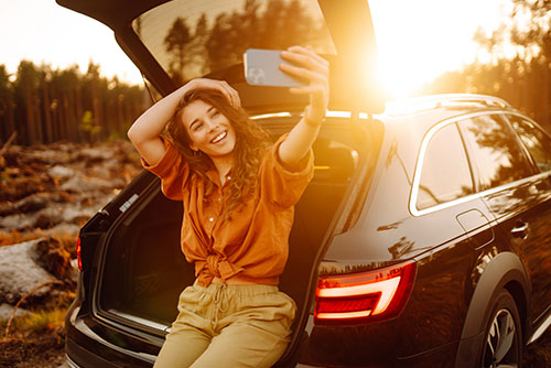 Local Minnesota woman enjoying her new car after getting a discounted rate on her auto loan from Gate City Bank