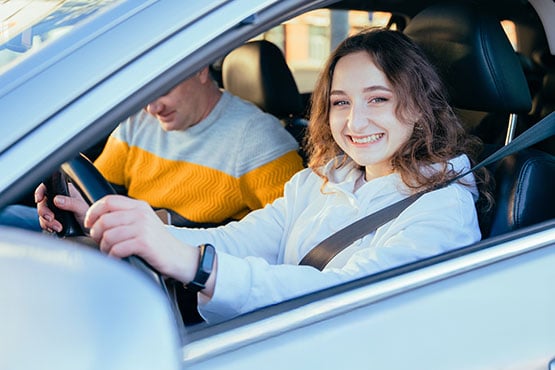 Local Minnesota student driving her first after getting an auto loan from Gate City Bank.