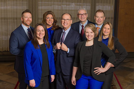 Gate City Bank’s executive leadership team gathers together for a group photo