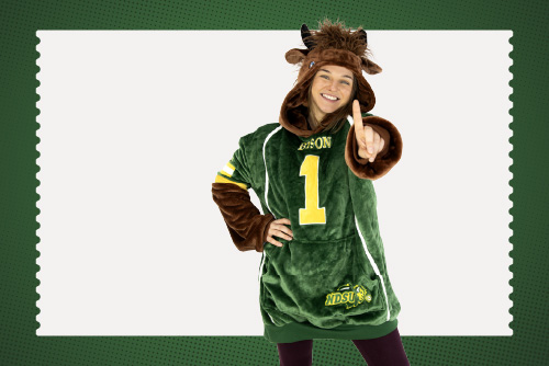 NDSU student wearing a Bison Snugible, smiling after opening her checking account in downtown Fargo, ND