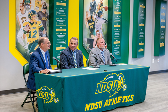 Kevin Hanson, Gate City Bank President & CEO, Matt Larsen, NDSU Director of Athletics and Tim Polasek, NDSU Football Head Coach, speak at a press conference about Gate City Bank being named the first all-sport jersey patch partner of NDSU Athletics.